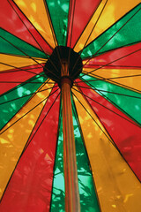 Colorful umbrella in the park, close-up, background.