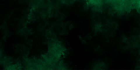 Abstract dark green or black watercolor texture, dresembling a nebula or cosmic cloud formation, lime green smoke or fog on a black background, old vintage grunge design green Christmas background.