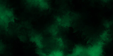 Abstract dark green or black watercolor texture, dresembling a nebula or cosmic cloud formation, lime green smoke or fog on a black background, old vintage grunge design green Christmas background.