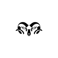 Silhouette of a ram's head with large curved horns in black against a white background