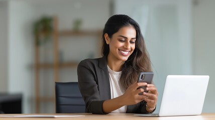 A young Indian girl uses her cell phone for business talk and job.