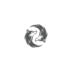 Yin and yang wolf heads create a circular, stylized design on a white background