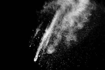 White powder explosion on black background.