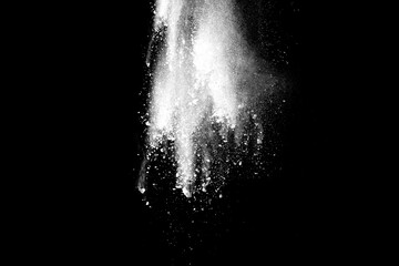 White powder explosion on black background.