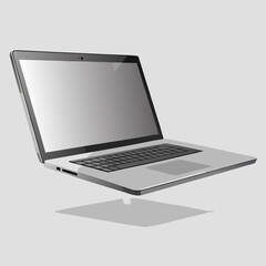 Sleek silver laptop with blank screen and shadow