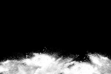 White powder explosion on black background.