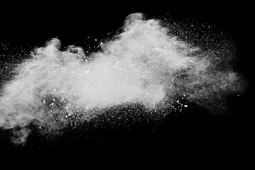 White powder explosion on black background.