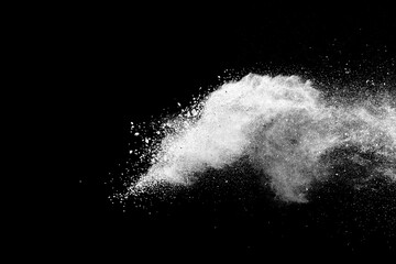 White powder explosion on black background.