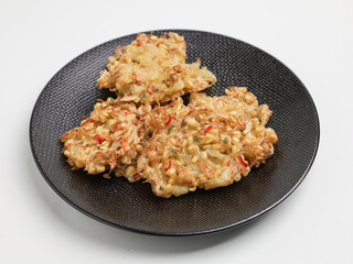 Vegetable fritters on white background