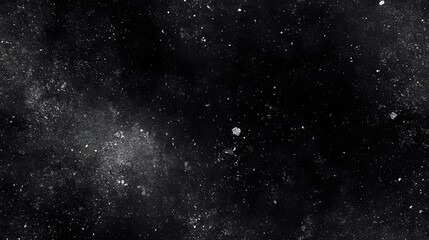 Fototapeta premium Dark textured background with white speckles and dust particles.