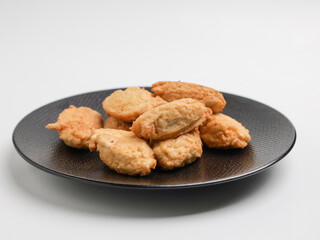 Vegetable fritters on white background