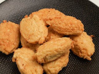 Vegetable fritters on white background