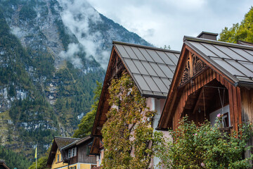 Obraz premium Hallstatt Village, Austria. Scenic Alpine Landscape with Traditional Houses and Calm Water Reflections