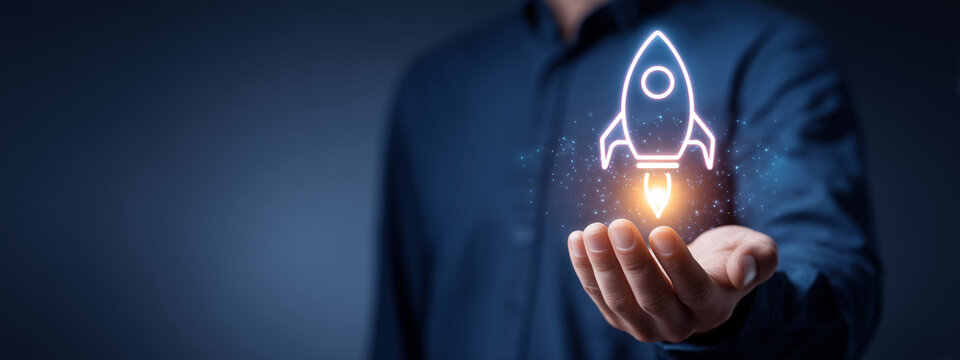 Businessman holding a glowing rocket icon - Powered by Adobe