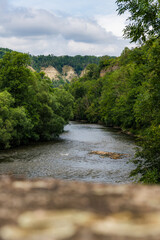View from Historic Bridge in Amt-Creuzburg over Werra River to Ebenauer Köpfe, Germany, Portrait Orientation