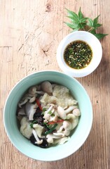 Lyophyllum decastes sujebi is a handmade Korean soup with mushrooms and rich broth by master chef Hanshunseop. Photographed in Korea.