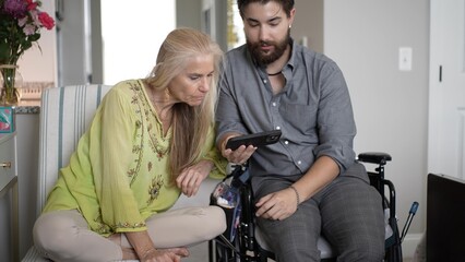 Mother and Son Share Joyful Moments Through Memories and Smartphone Pictures