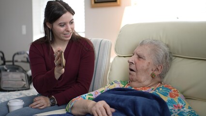Son Shares Memories With Mother While Relaxing Together in Cozy Living Room