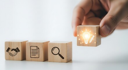 Creative process portrayed by wood blocks with idea, document, search, and collaboration concept highlighting innovative thinking.