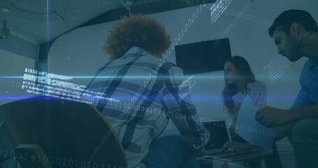 Discussing project details coworkers sitting around coffee table in office, with laptop documents