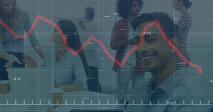 Smiling man in denim shirt sitting in office, with red line graph overlay, copy space