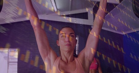 Raising arms overhead woman wearing peach sports bra and leggings in studio with yellow overlay