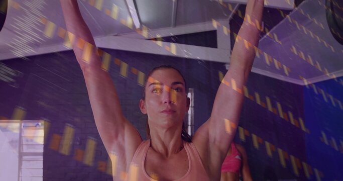Raising arms overhead woman wearing peach sports bra and leggings in studio with yellow overlay