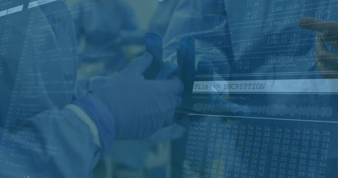 Inspecting gloved team examining handheld device at workstation in lab with encryption code overlay