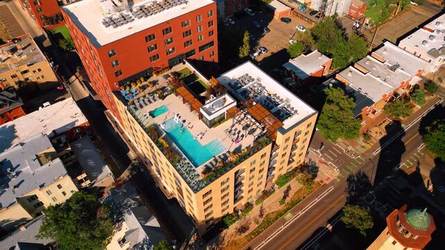 Building with a swimming pool on the roof. Aerial perspective on the neighborhood of Denver, Colorado, USA.