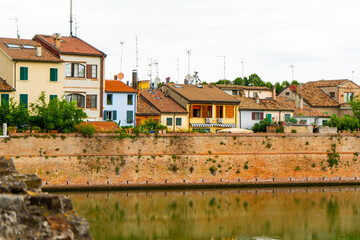 Obraz premium Old Italian colorful houses in Rimini city Italy. River embankment