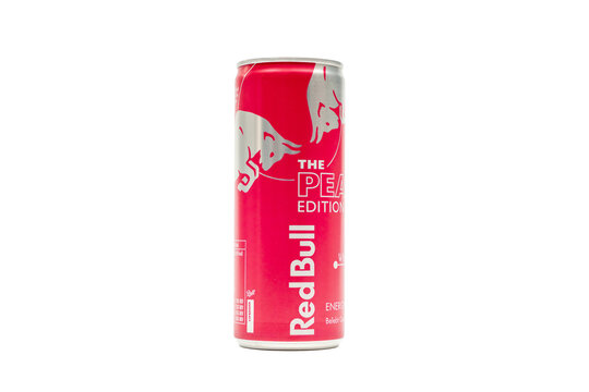 Germany Berlin October 10, 2025. Single Peach Edition Red Bull can front. A Peach Edition Red Bull can in pink color stands upright. The design shows bulls and bold lettering.