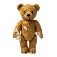 Old vintage teddy bear toy with patches and stitches