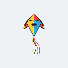 A colorful kite with a tail floats against a light background.