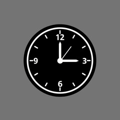 Black and white clock face showing three o'clock on a gray background.