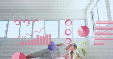 Female athlete holding side plank and raising ball causing fitness analytics charts expanding - Powered by Adobe