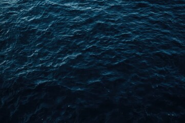 Dramatic Deep Blue Ocean Surface with Dynamic Ripples and Waves Reflecting Light