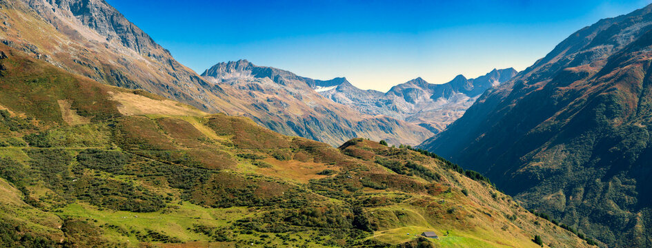 Panoramic view from the Glacier Express over the landscape near Realp in the canton of Uri in autumn, Switzerland;