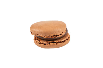 Single brown macaron close-up. A brown macaron with chocolate filling photographed in detail. Crunchy shell and creamy center are visible. Macaron on a transparent background.