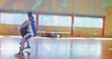 Trainer blowing whistle starting dribbler attacking rim in sports drill with new guard defending - Powered by Adobe