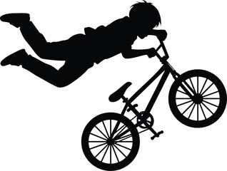 Fototapeta premium Silhouette of Freestyle BMX Biker Performing a Trick Isolated on White
