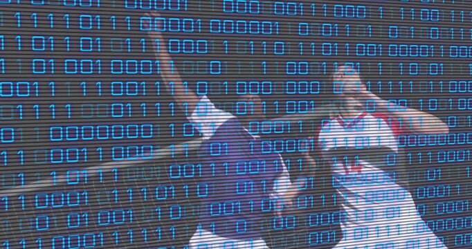 Two soccer players sprinting toward ball outside penalty box, leaping heading ball forward to chase