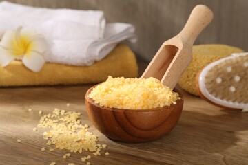 Natural sea salt on wooden table, closeup