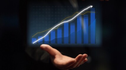 A hand presents a digital chart showcasing the upward trend of colorful bars and a line graph, symbolizing growth and success in the business world. Copula