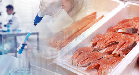 Food quality analysis. Laboratory workers dropping liquid into test tube, double exposure with...