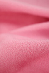 Abstract pink fleece texture. Fashion, textiles, accessories.