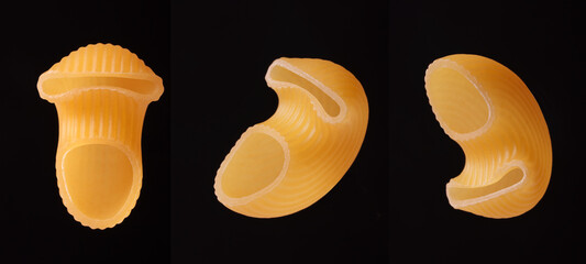 Close-up of unusually shaped pasta on a black background.