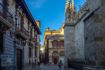 Obraz premium View of Oficios Street in Granada, Andalusia, Spain, with historic buildings such as the cathedral