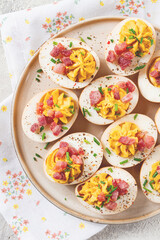 Spicy, stuffed ramen eggs, with bacon and green onions, homemade, no people,