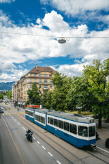 Blue and White Tram on Tracks in Urban Zurich, Switzerland