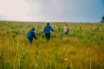 A group of hikers at the high altitude moorland ecological zone of Mount Napak in Karamoja Region, Uganda
